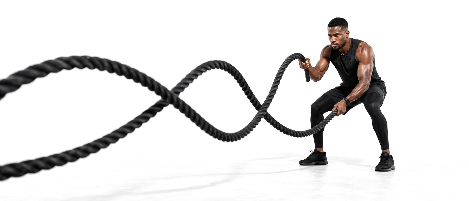 Fyrefit trainer working battle ropes